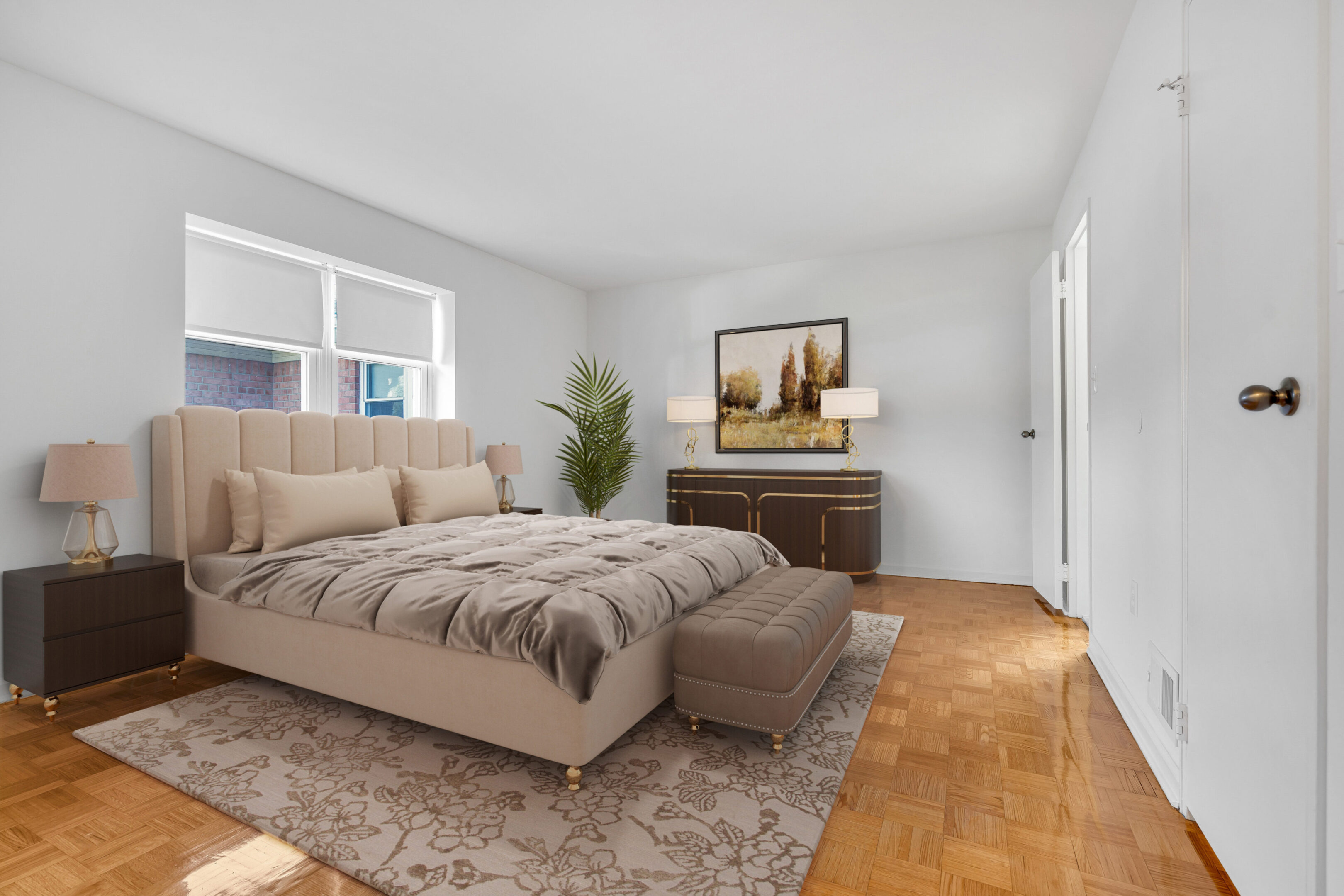 A bedroom with a bed, dresser and window.