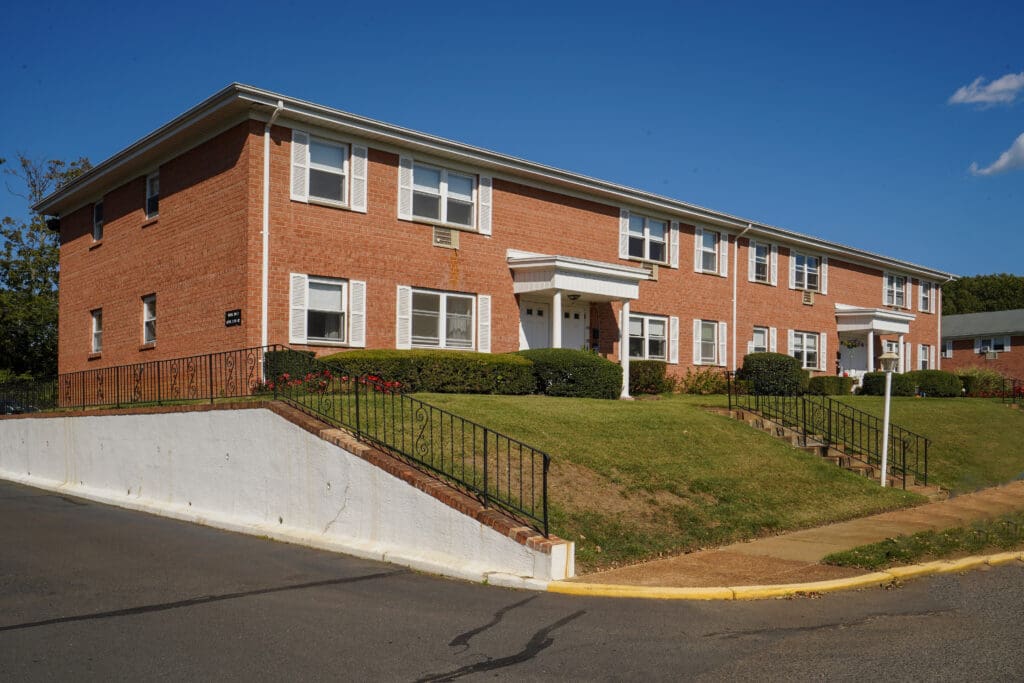 A brick building with steps leading up to it.